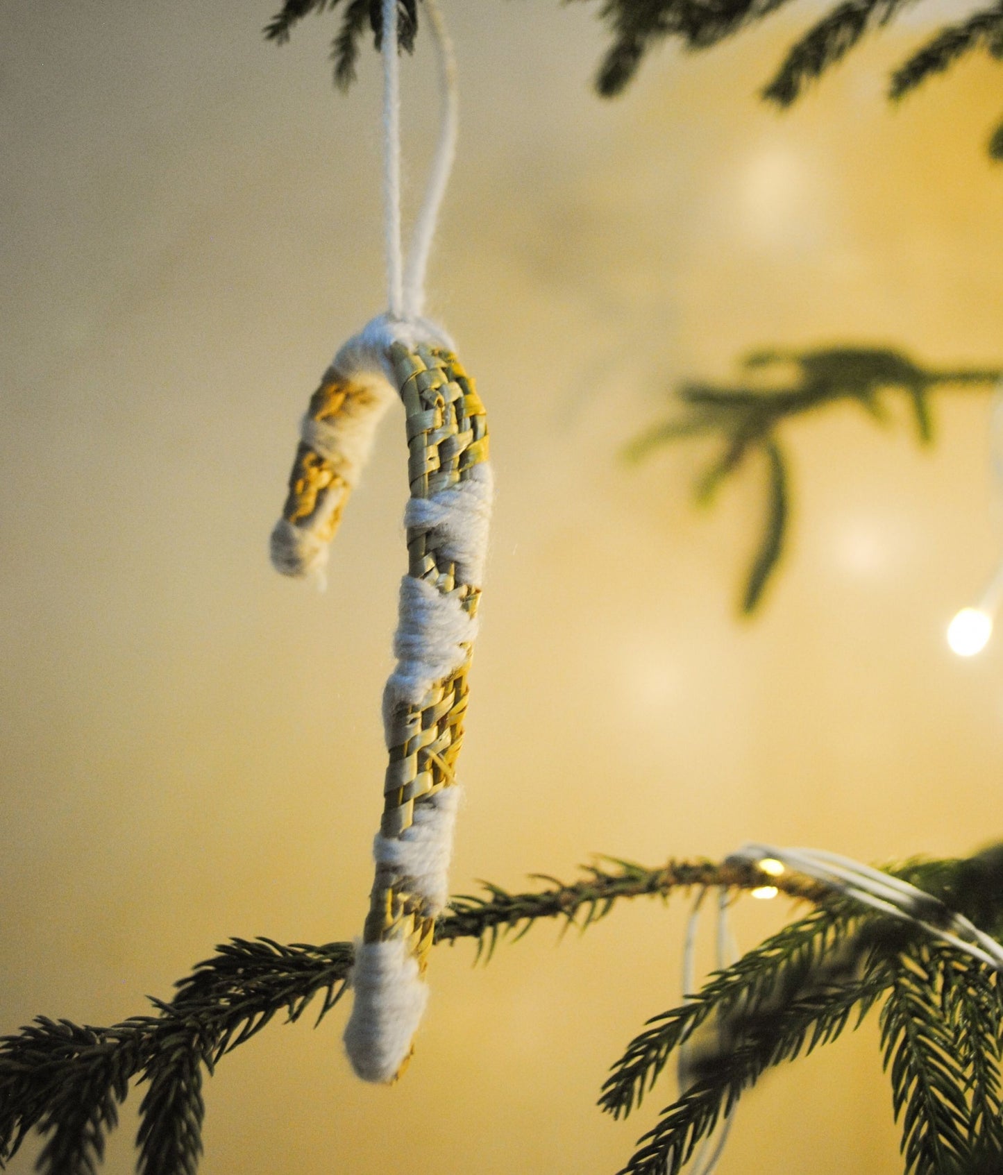 Handcrafted golden grass weavers create decorative items for Christmas, as new designs to keep the old art relevant in modern days