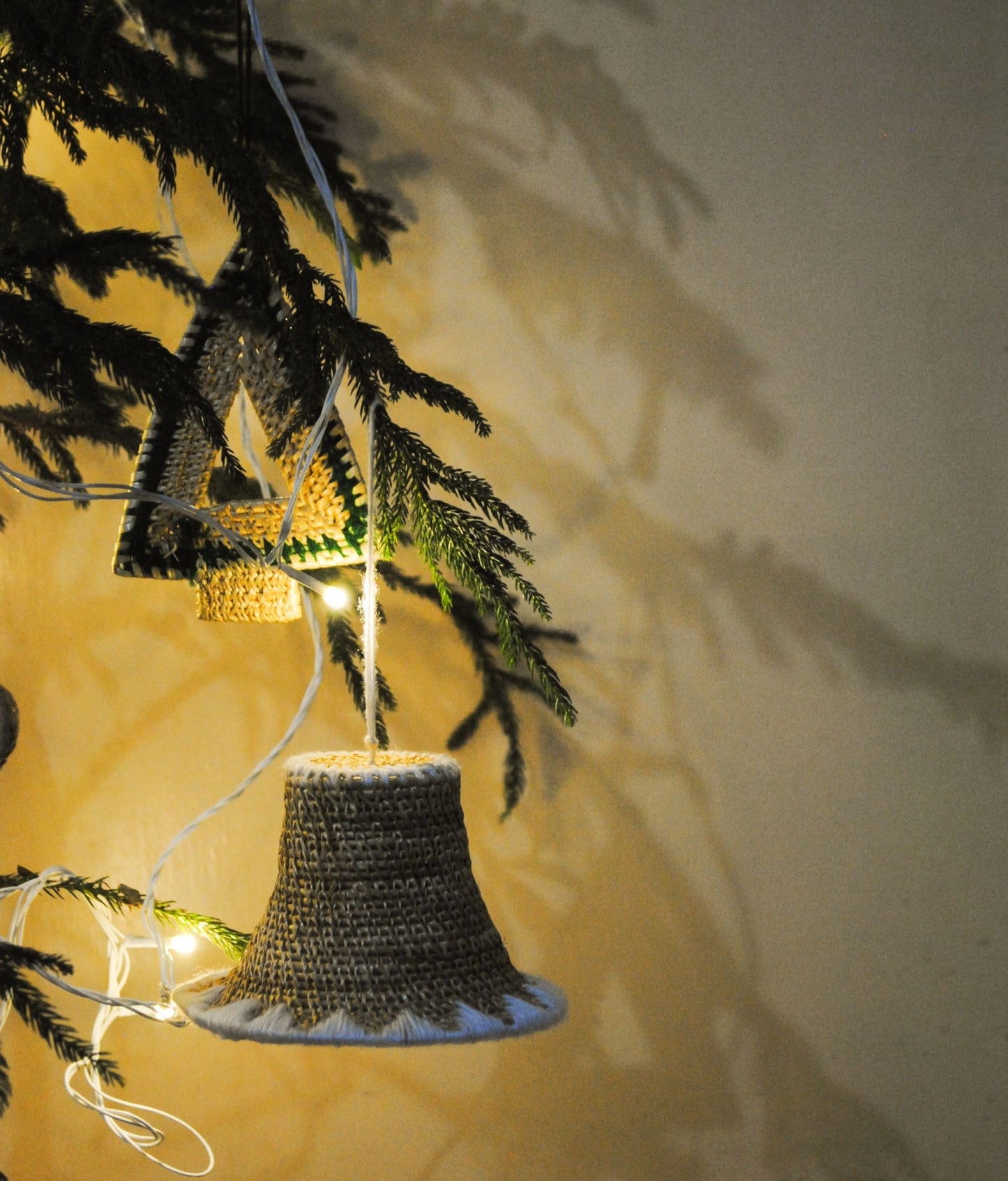 Handcrafted golden grass weavers create decorative items for Christmas, as new designs to keep the old art relevant in modern days