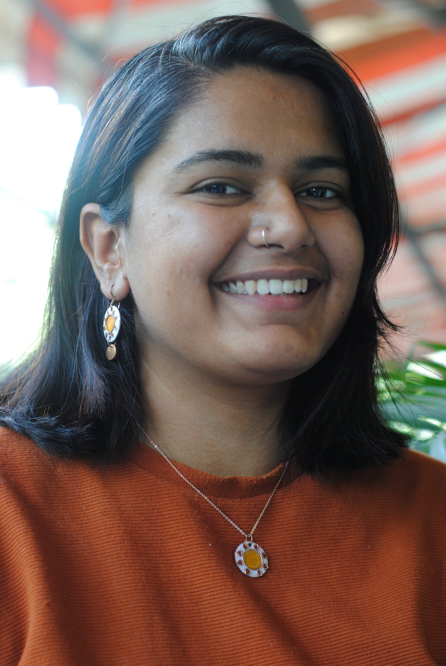 Copper enamel trinkets, funky earrings handcrafted in Maharashtra, India. Sun sooraj theme
