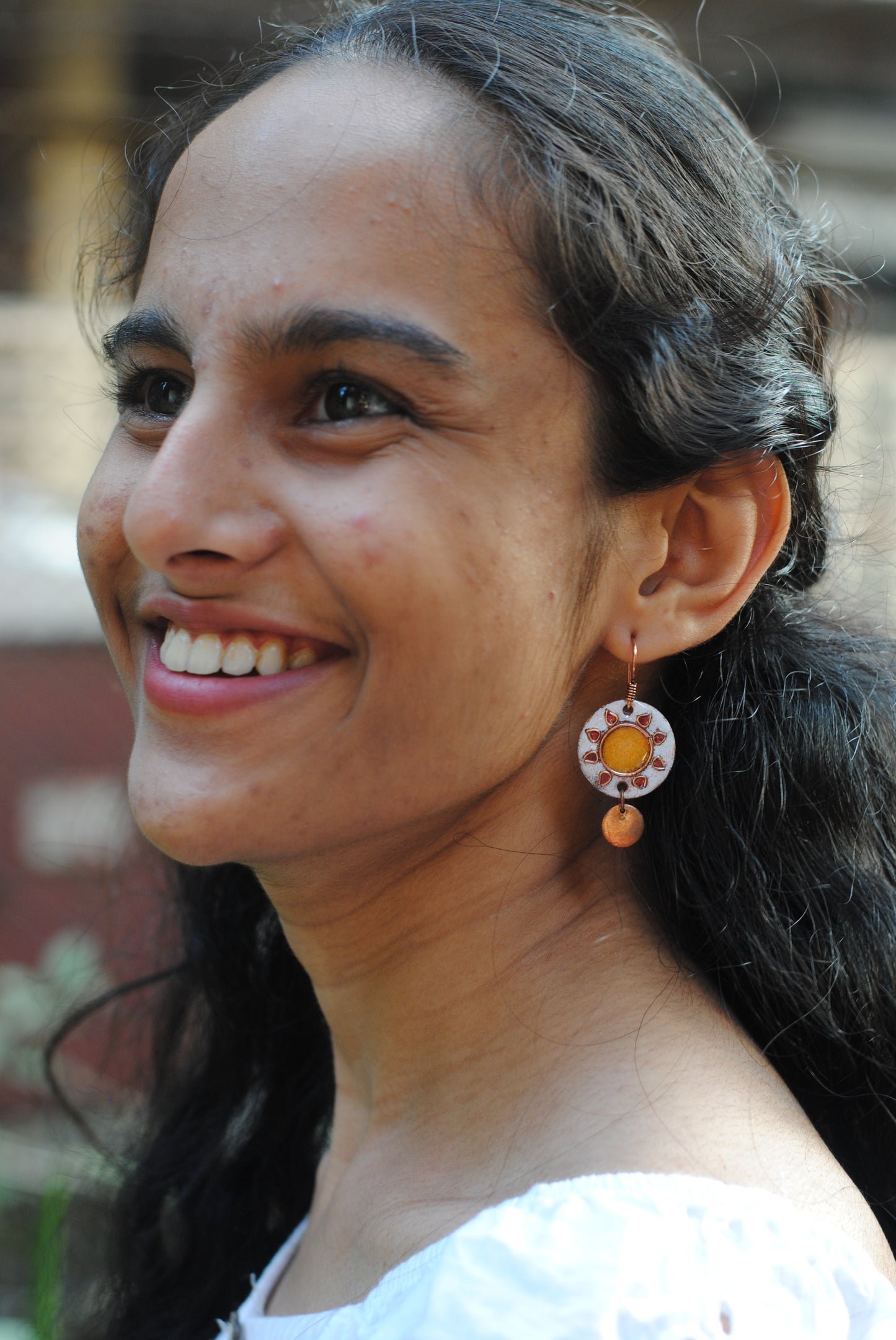 Copper enamel trinkets, funky earrings handcrafted in Maharashtra, India. Sun sooraj theme
