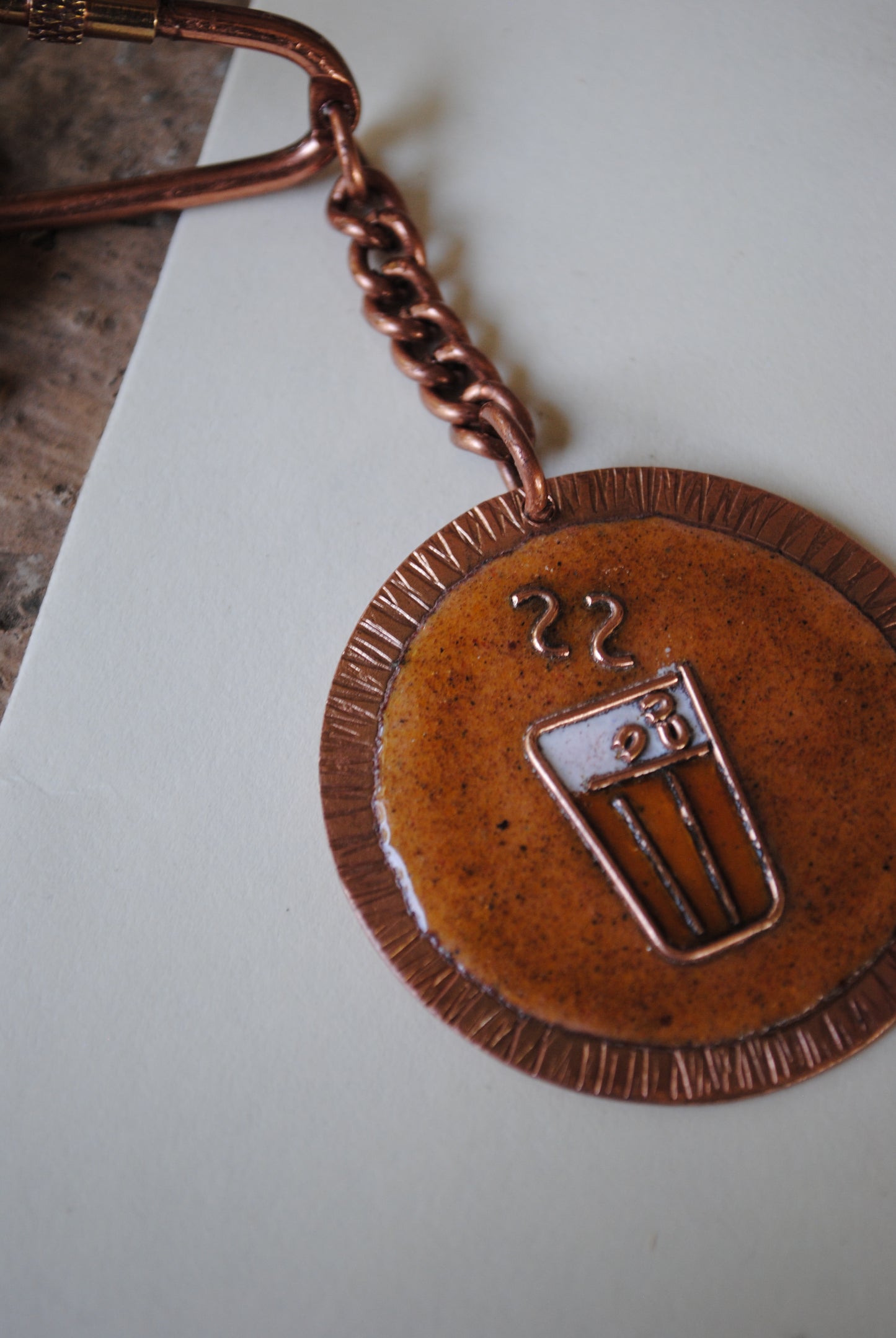 Copper enamel trinkets, funky keychains handcrafted in Maharashtra, India. Chai paani theme