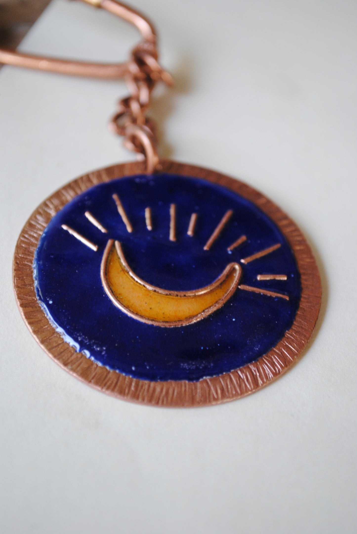 Copper enamel trinkets, funky keychains handcrafted in Maharashtra, India. Moon theme
