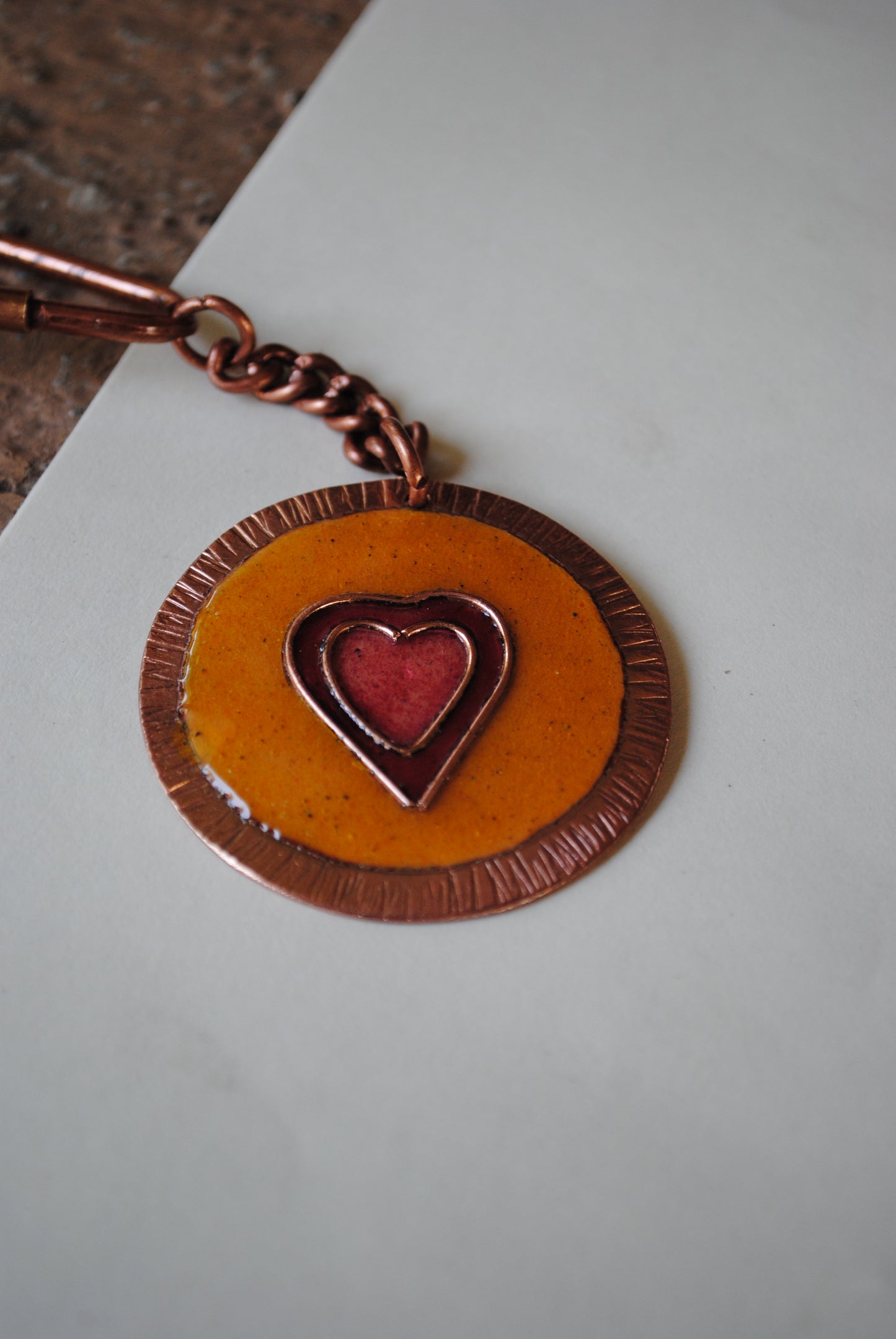 Copper enamel trinkets, funky keychains handcrafted in Maharashtra, India. Dil heart theme