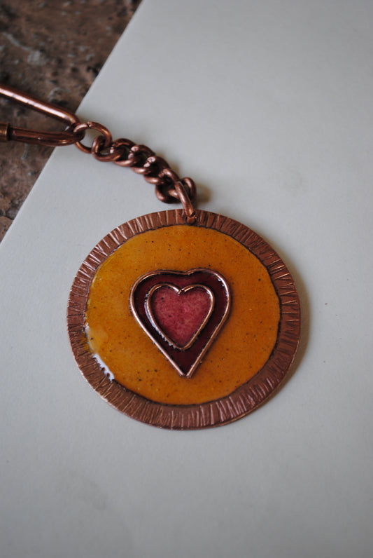 Copper enamel trinkets, funky keychains handcrafted in Maharashtra, India. Dil heart theme