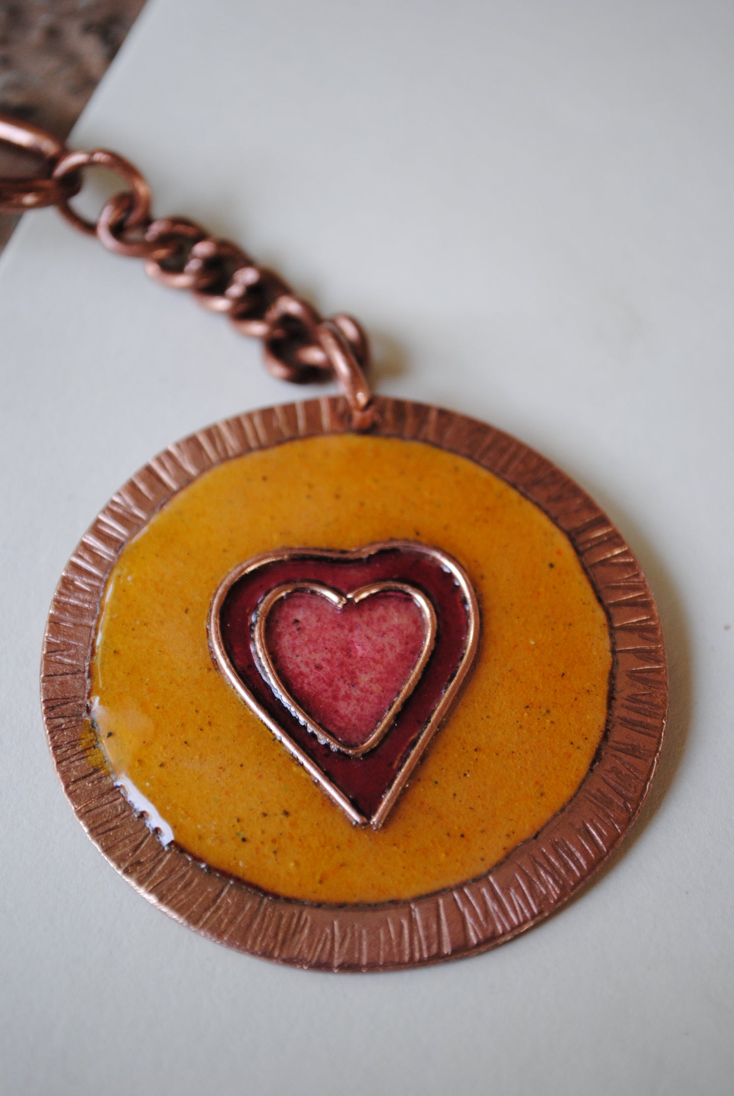 Copper enamel trinkets, funky keychains handcrafted in Maharashtra, India. Dil heart theme