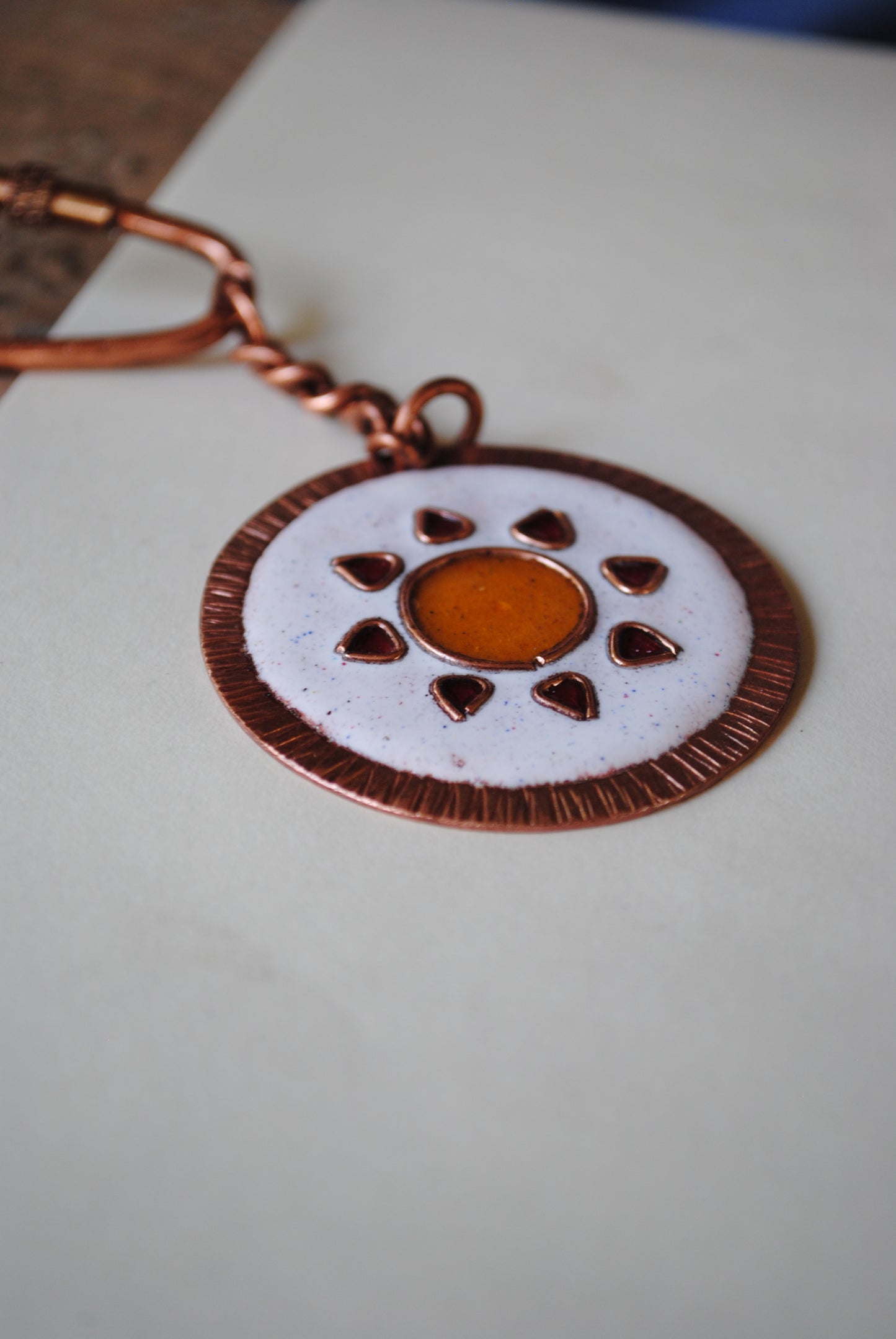 Copper enamel trinkets, funky keychains handcrafted in Maharashtra, India. Sooraj sun theme