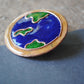 Copper enamel trinkets, funky lapel pins handcrafted in Maharashtra, India. World map theme