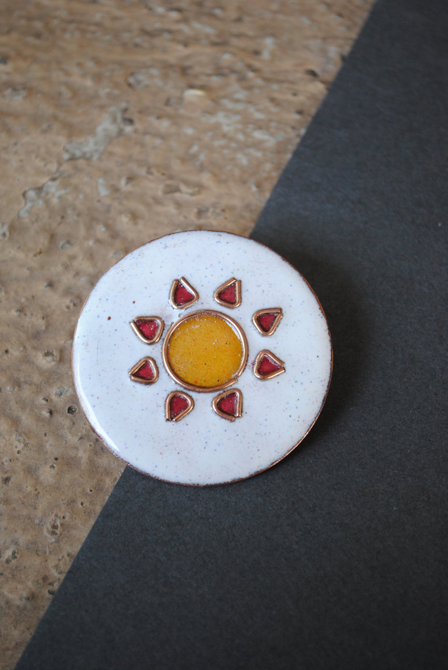 Copper enamel trinkets, funky lapel pins handcrafted in Maharashtra, India. Sun sooraj theme