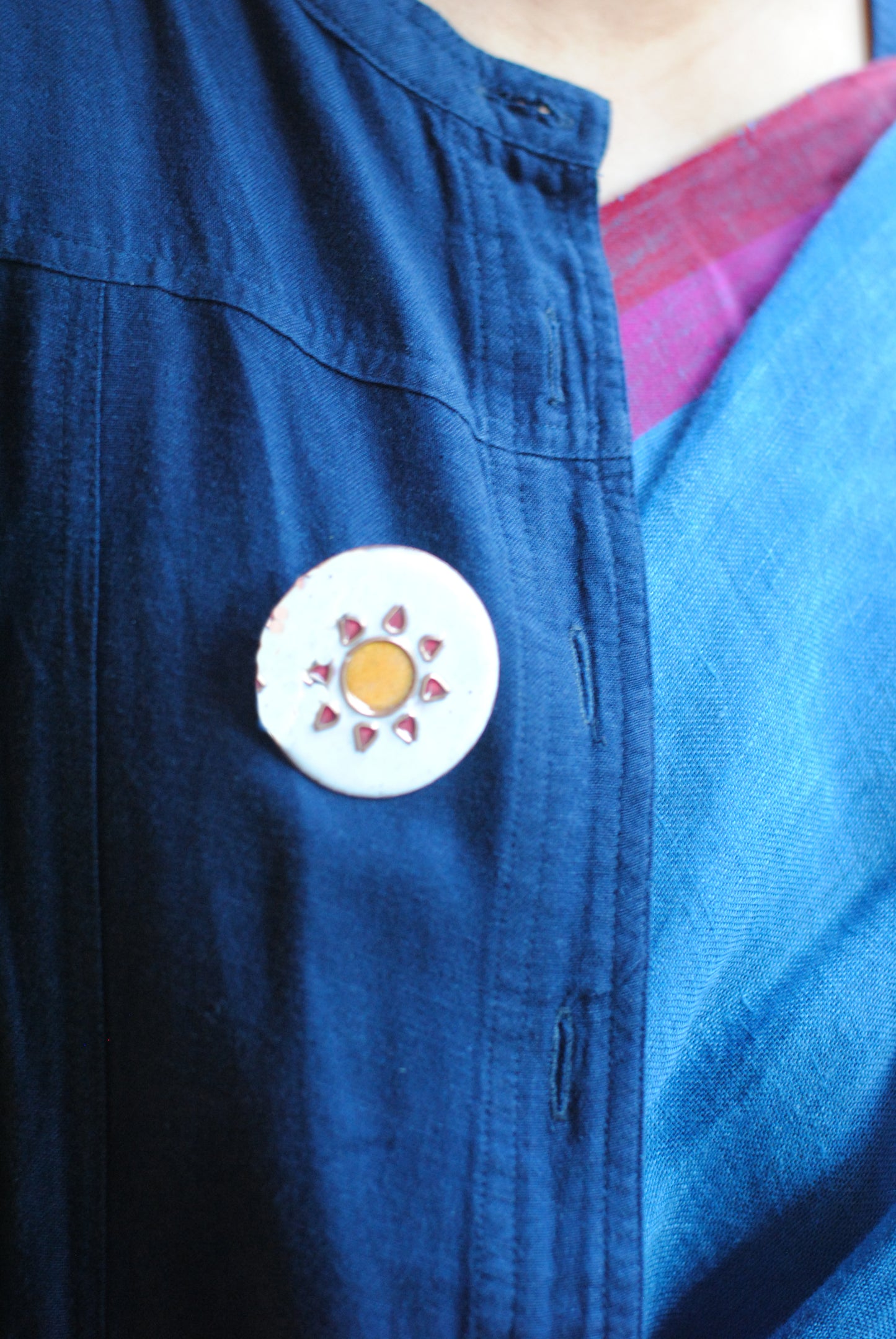 Copper enamel trinkets, funky lapel pins handcrafted in Maharashtra, India. Sun sooraj theme