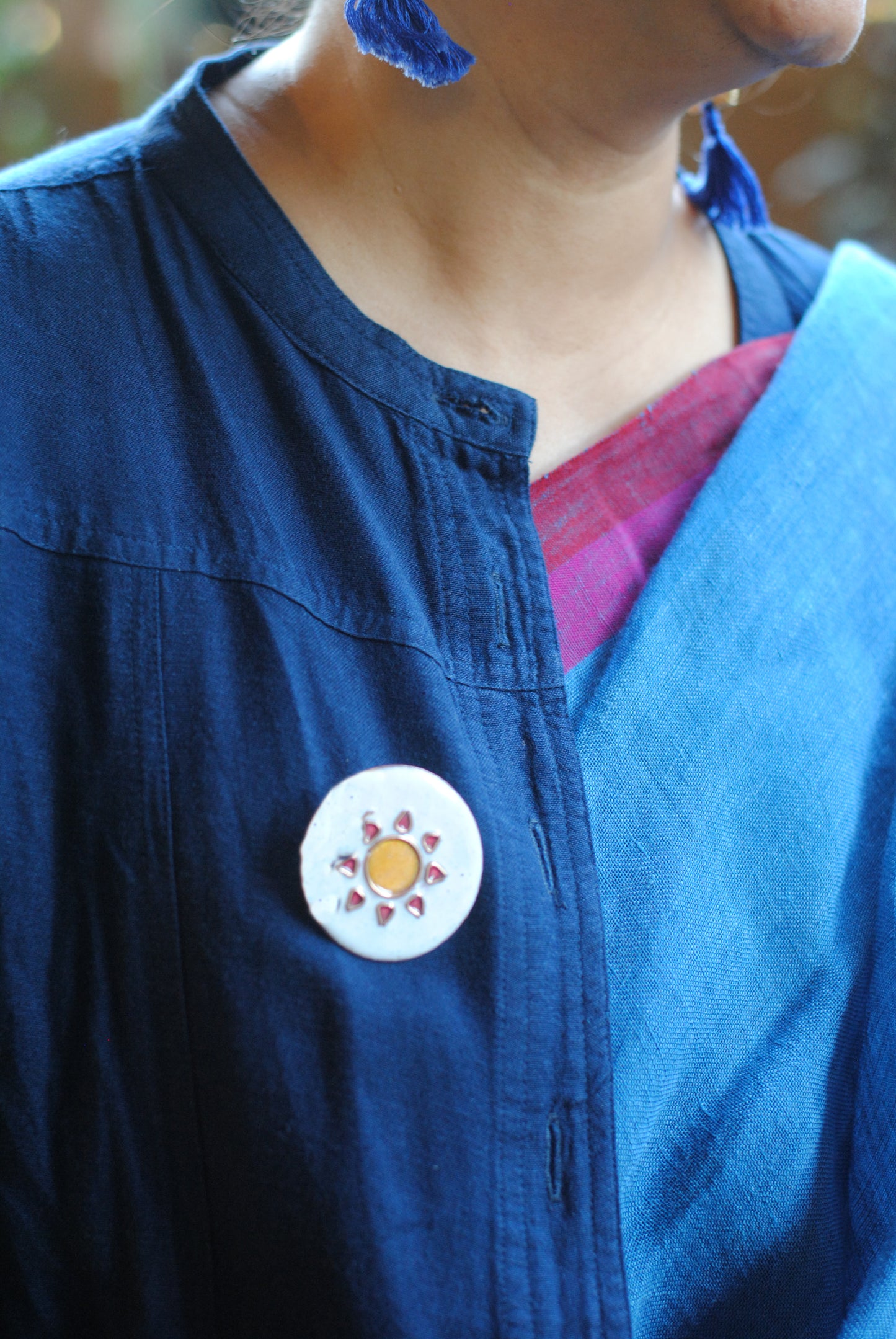 Copper enamel trinkets, funky lapel pins handcrafted in Maharashtra, India. Sun sooraj theme