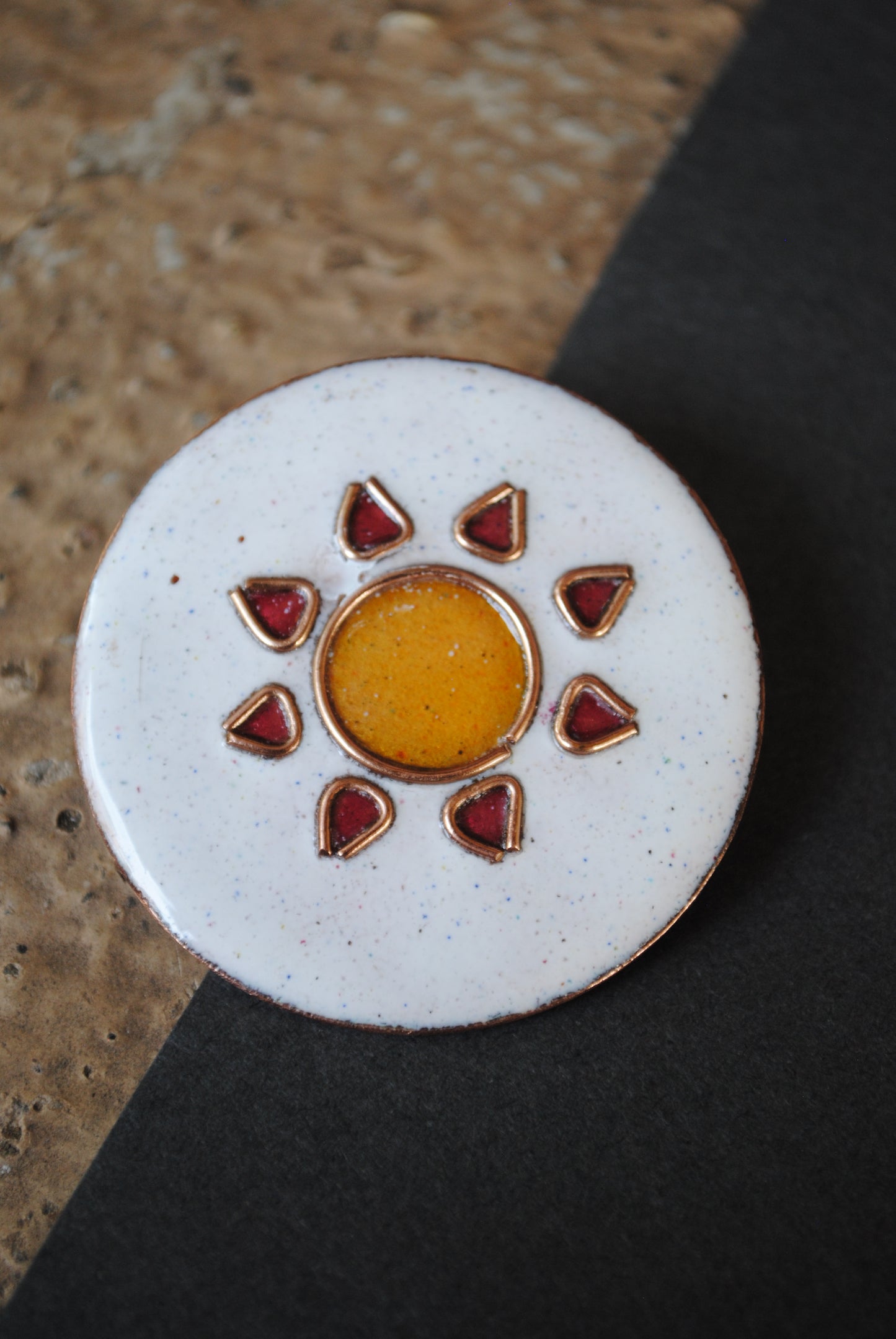 Copper enamel trinkets, funky lapel pins handcrafted in Maharashtra, India. Sun sooraj theme