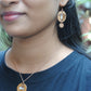 Copper enamel jewelry, funky pendant handcrafted in Maharashtra, India. Chai paani theme