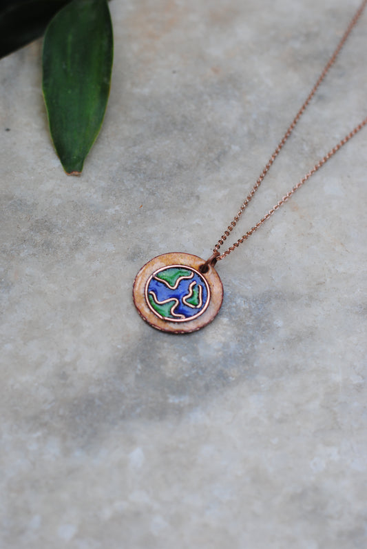 Copper enamel trinkets, funky pendant handcrafted in Maharashtra, India. World map theme