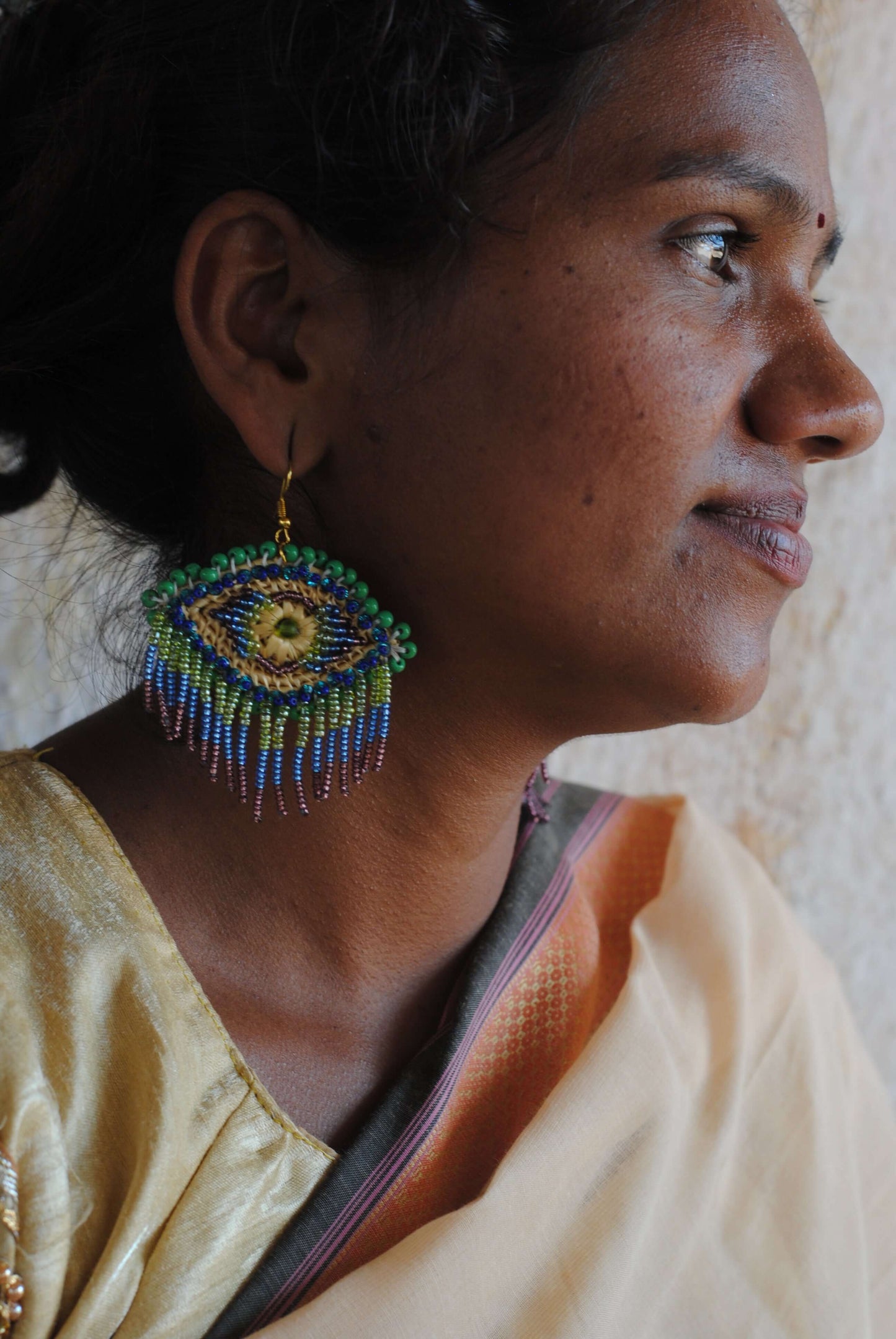 Truna natural fibre golden grass and zardosi handcrafted jewelry from Odisha, nazar peacock blue earrings set