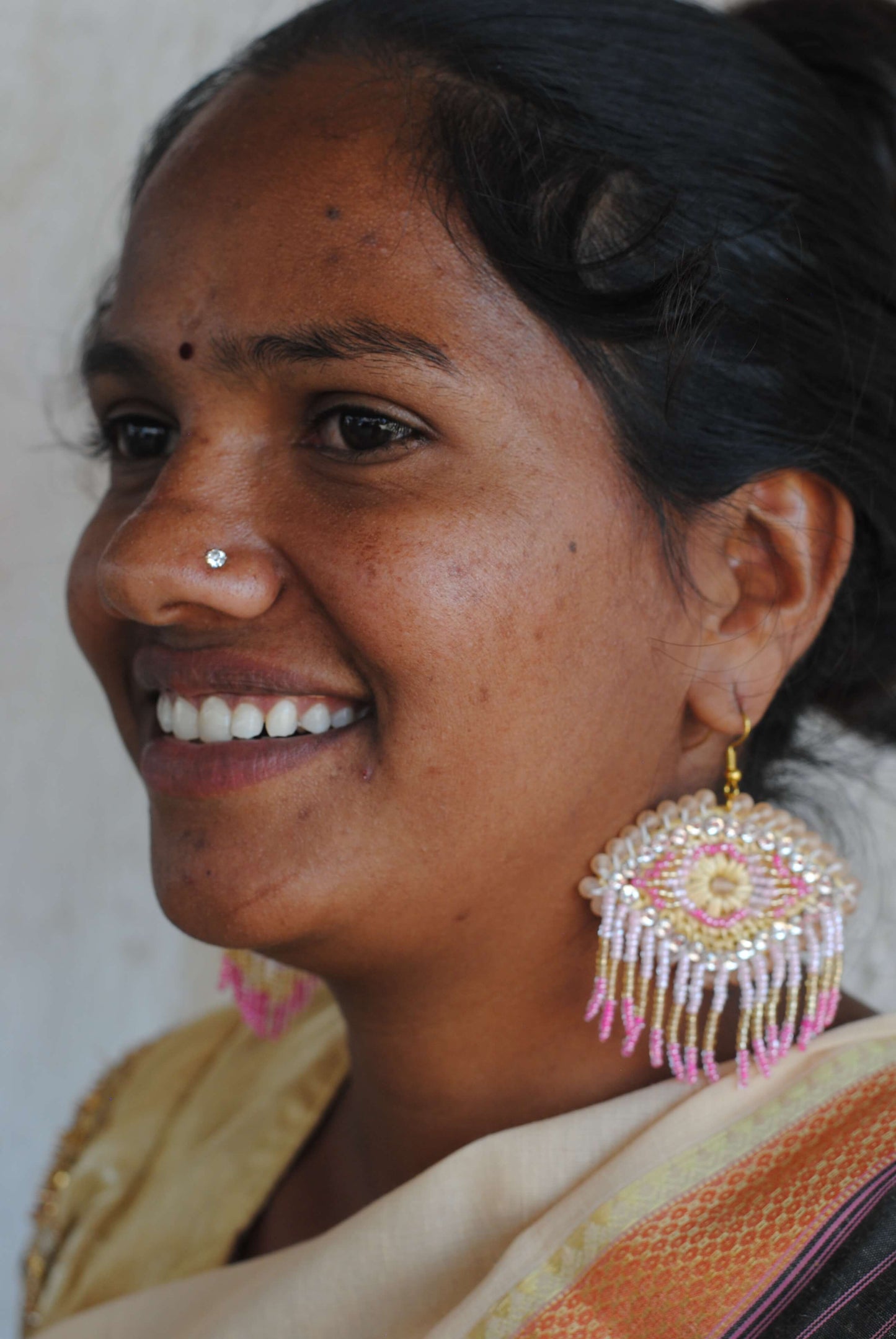 Truna natural fibre golden grass and zardosi handcrafted jewelry from Odisha, nazar pink earrings