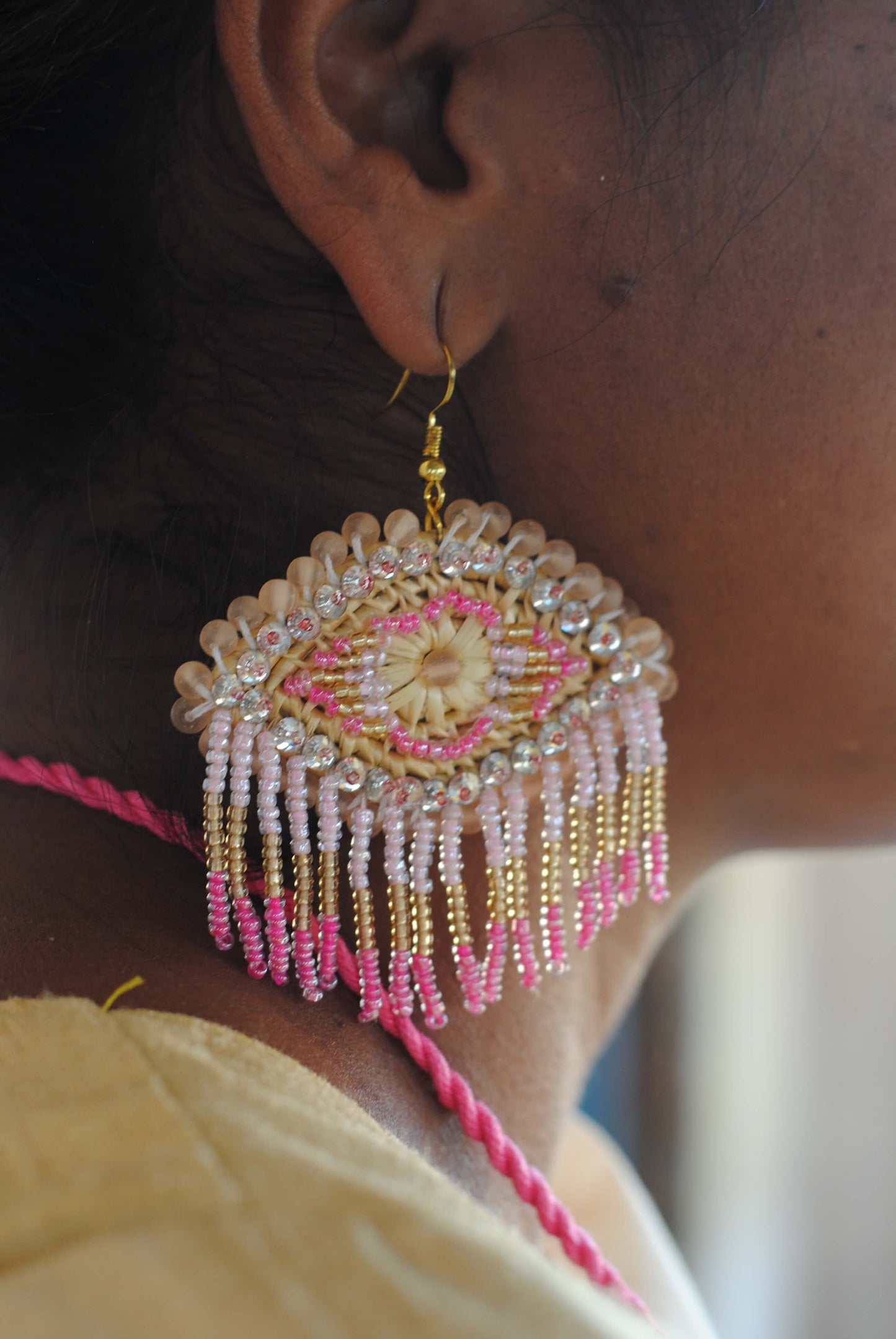 Truna natural fibre golden grass and zardosi handcrafted jewelry from Odisha, nazar pink earrings