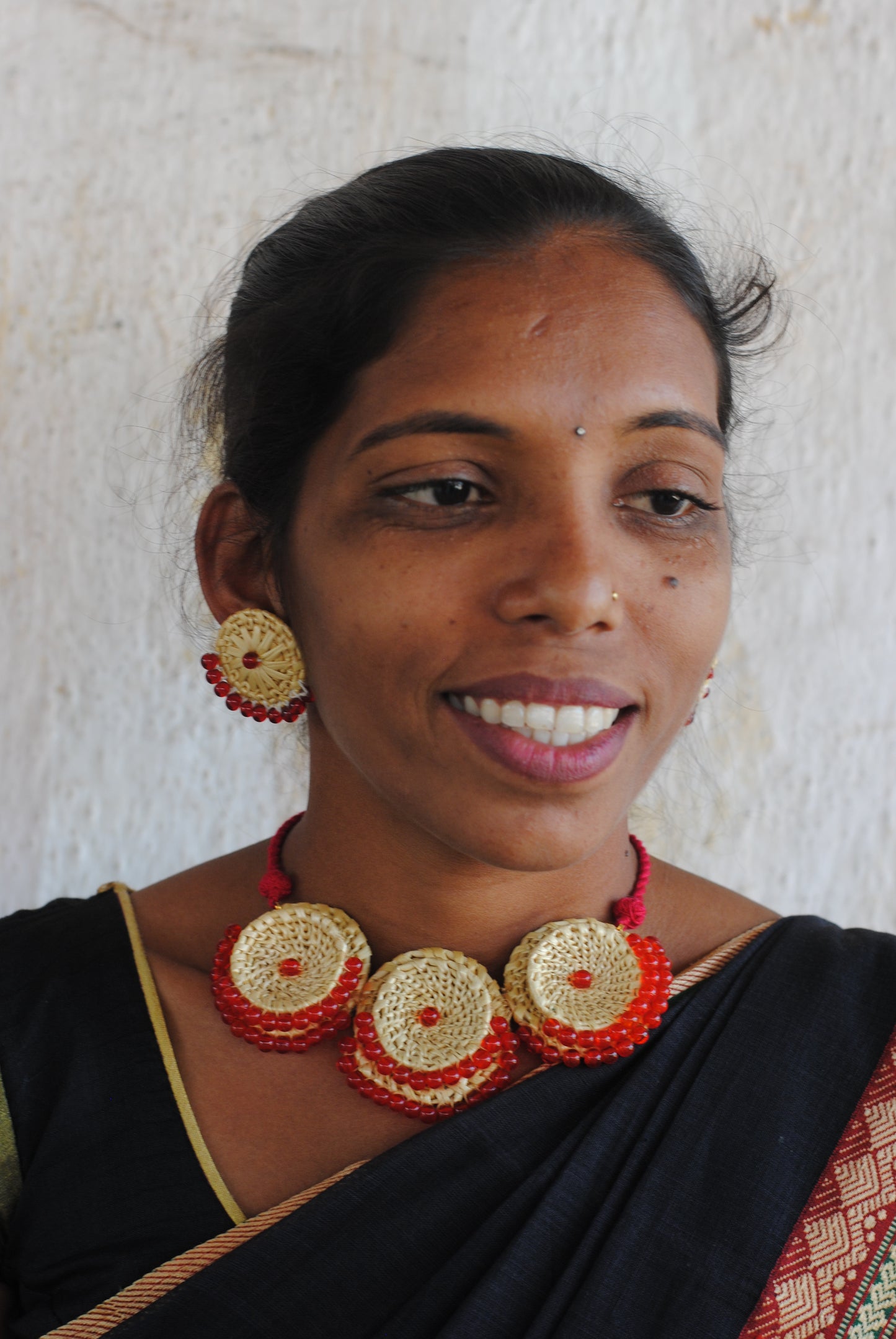 Handcrafted golden grass weavers create jewelry as new designs to keep the old art relevant in modern days