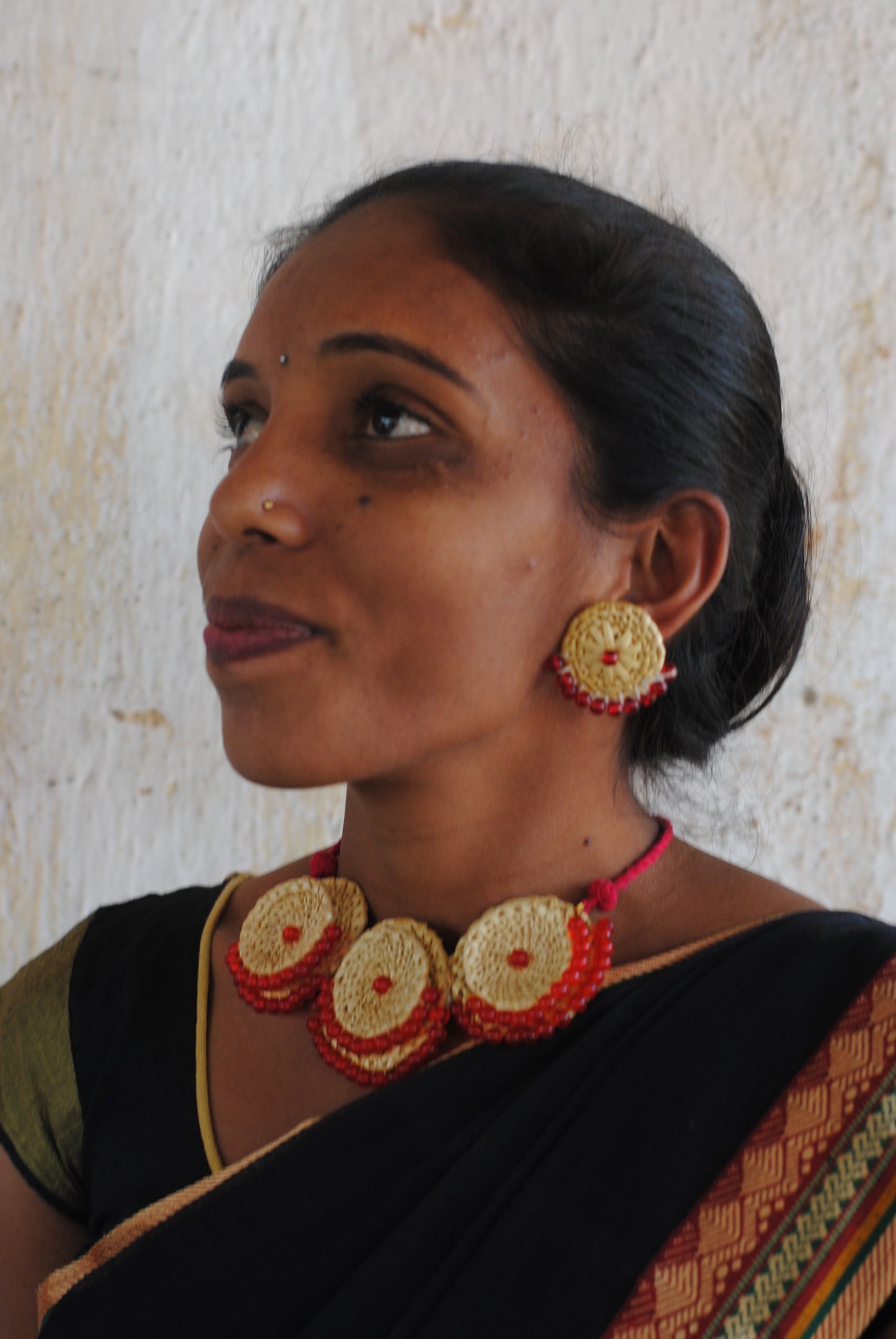 Handcrafted golden grass weavers create jewelry as new designs to keep the old art relevant in modern days
