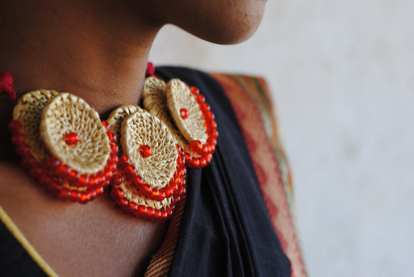 Handcrafted golden grass weavers create jewelry as new designs to keep the old art relevant in modern days