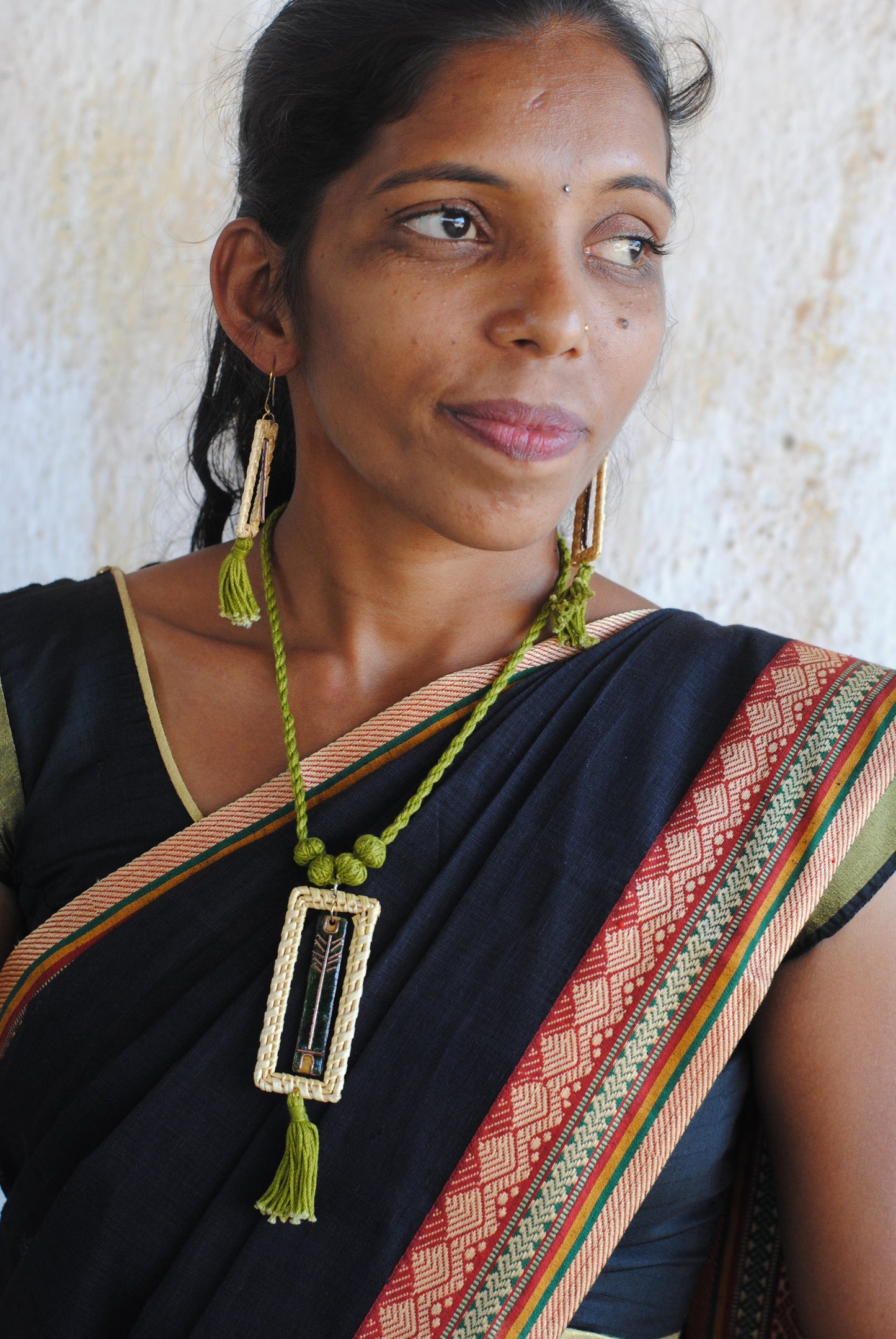 Truna natural fibre golden grass and copper enamel handcrafted jewelry from Odisha. Jharokha set of earrings and pendant