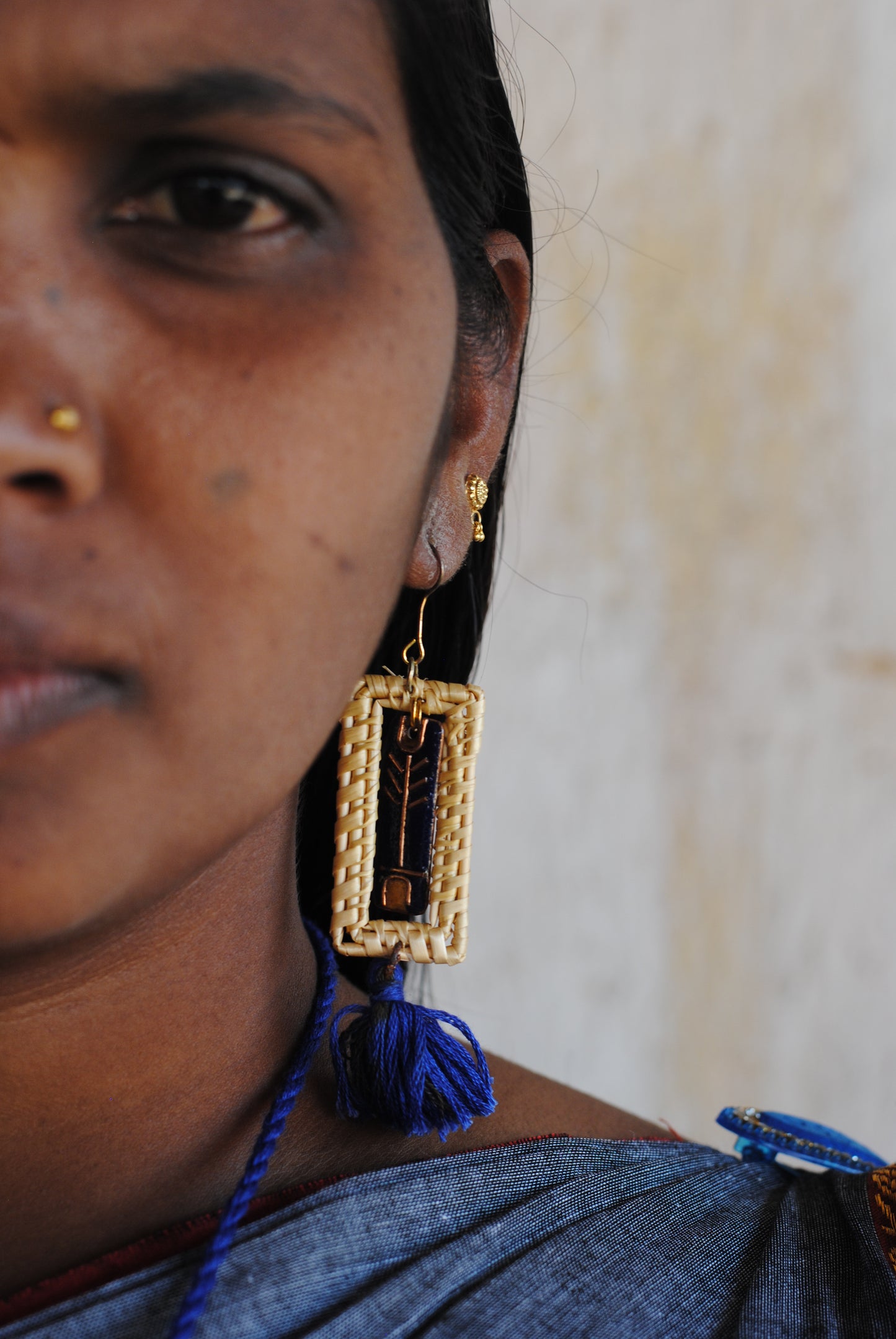 Truna natural fibre golden grass and copper enamel handcrafted jewelry from Odisha. Jharokha earrings in blue