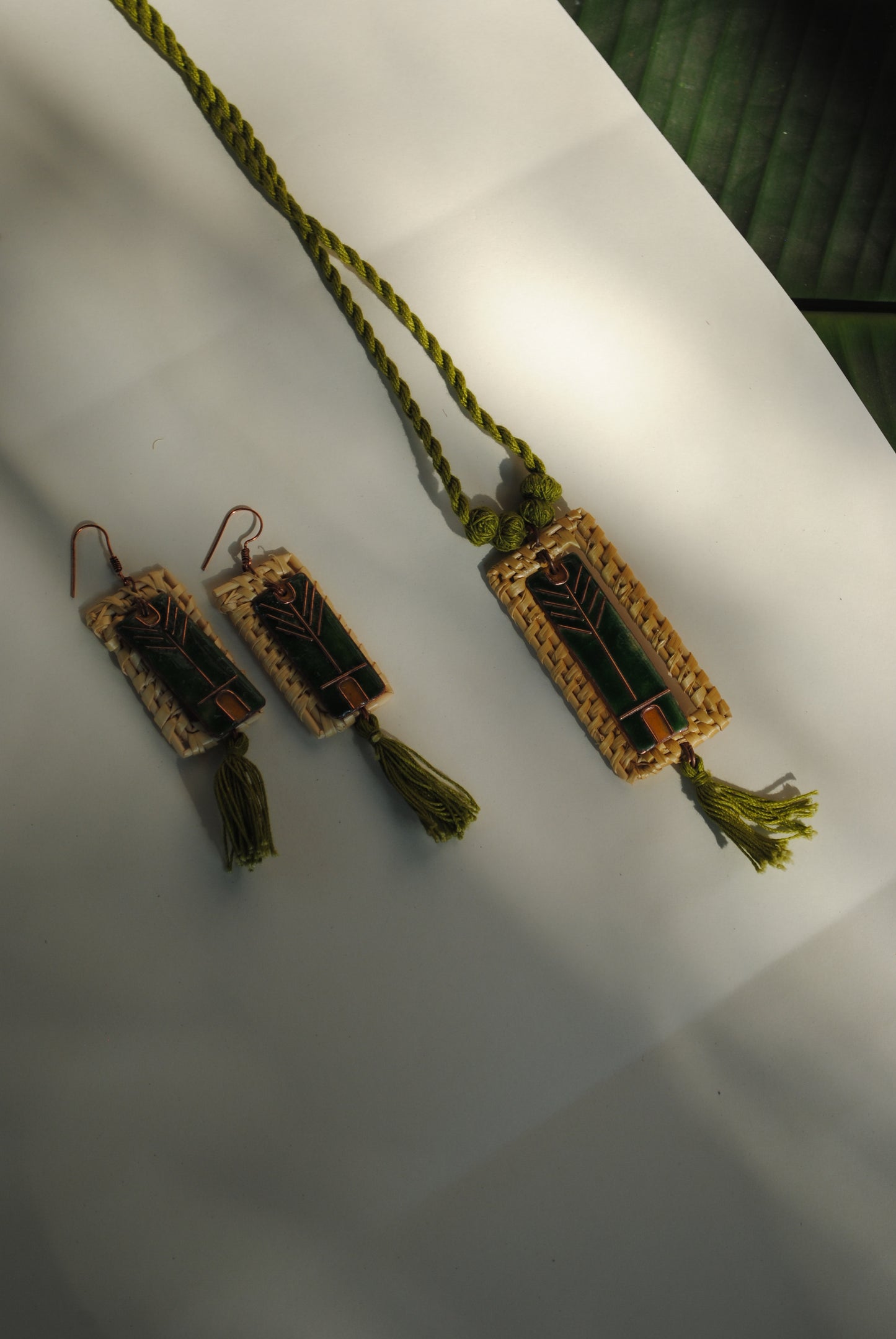 Truna natural fibre golden grass and copper enamel handcrafted jewelry from Odisha. Jharokha set of earrings and pendant