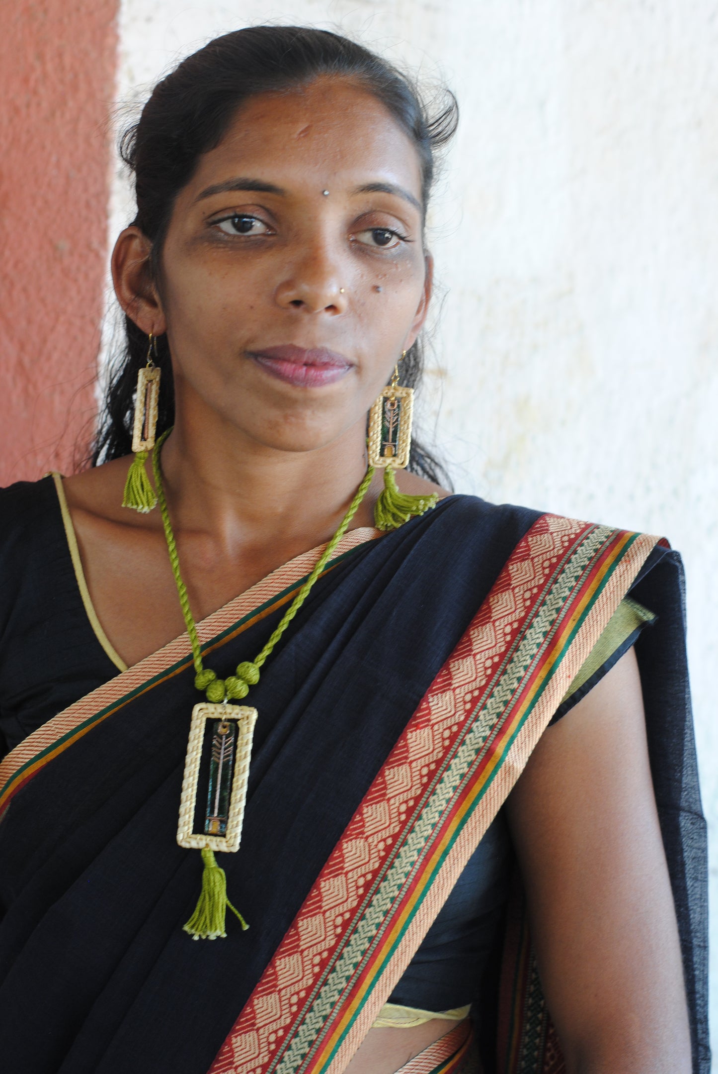 Truna natural fibre golden grass and copper enamel handcrafted jewelry from Odisha. Jharokha set of earrings and pendant