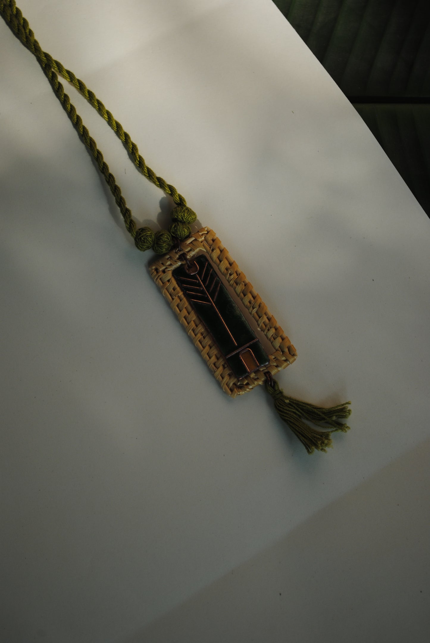 Truna natural fibre golden grass and copper enamel handcrafted jewelry from Odisha. Jharokha pendant