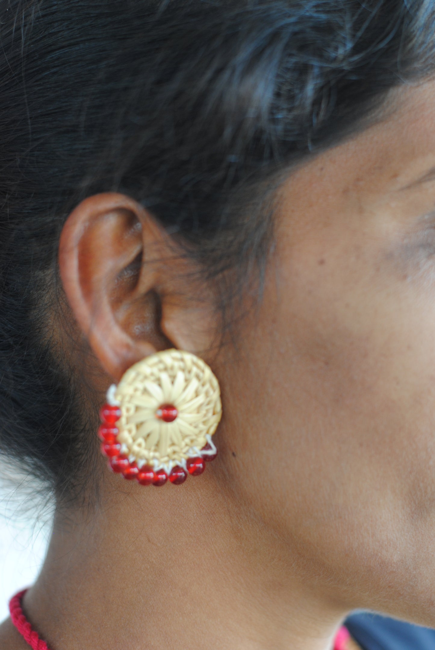 Handcrafted golden grass weavers create jewelry as new designs to keep the old art relevant in modern days