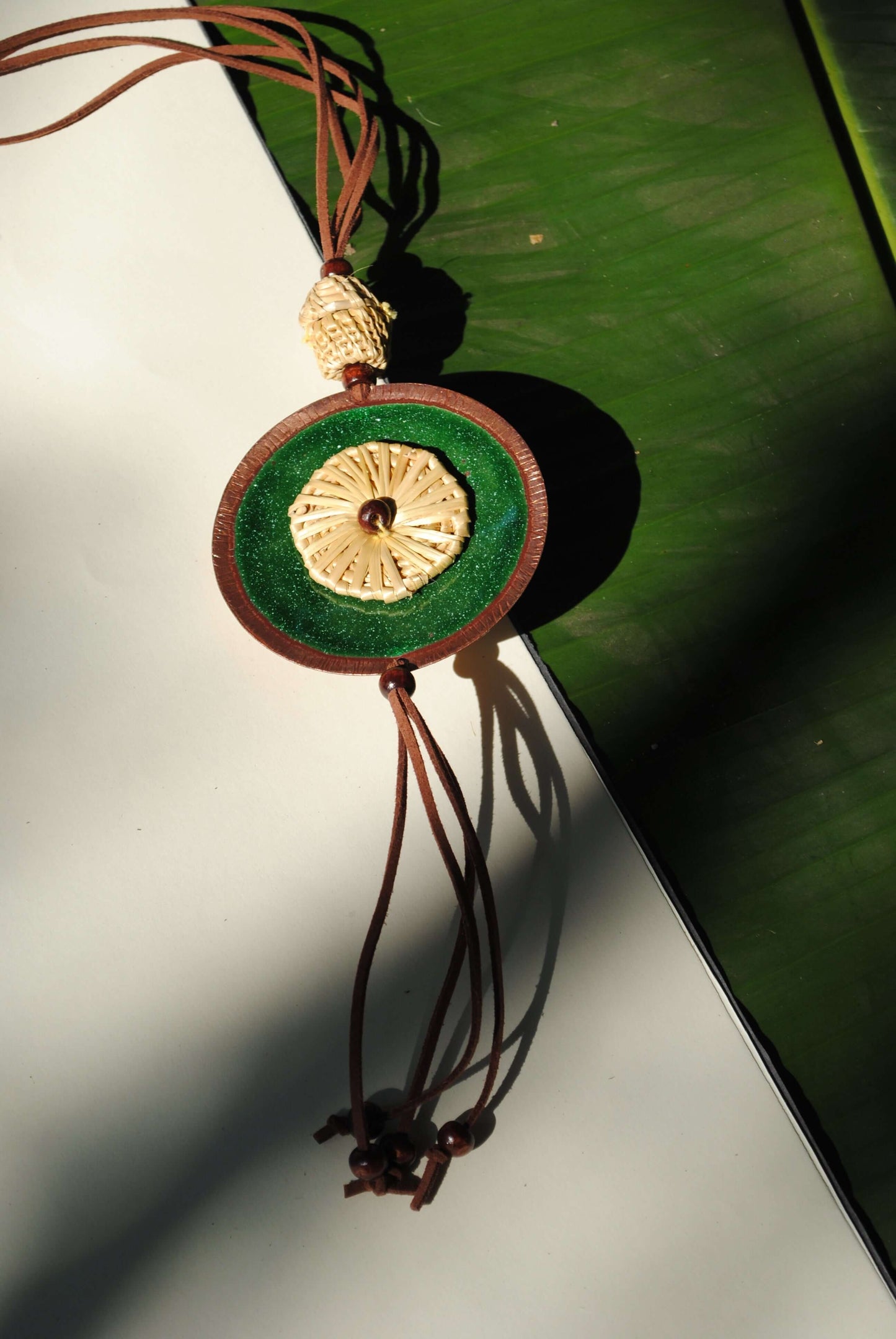 Truna natural fibre golden grass and copper enamel handcrafted jewelry from Odisha, Vaati green pendant