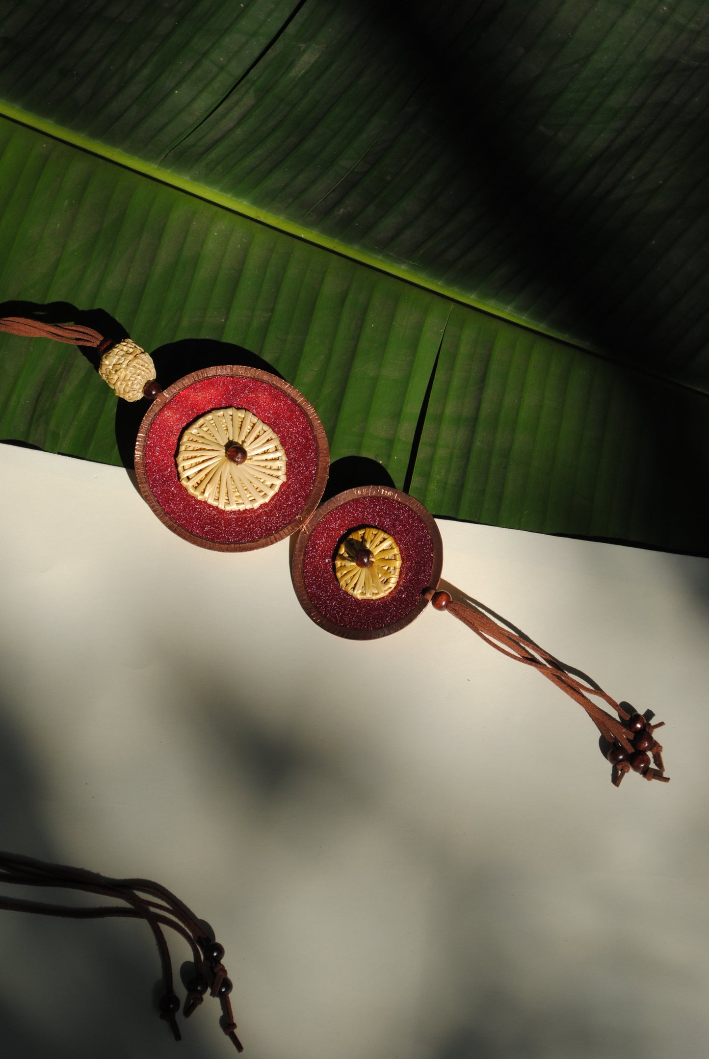 Truna natural fibre golden grass and copper enamel handcrafted jewelry from Odisha, Vaati red enamel pendant