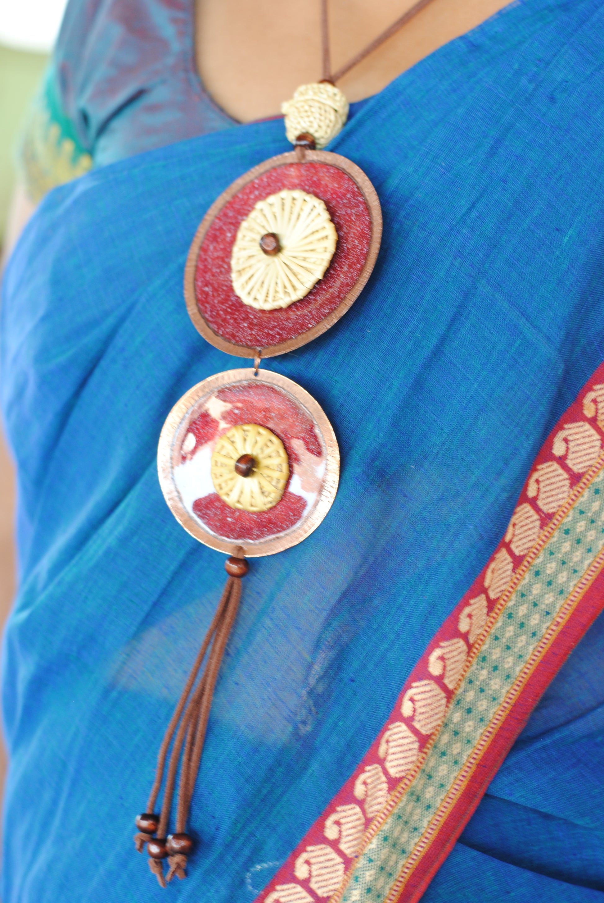 Truna natural fibre golden grass and copper enamel handcrafted jewelry from Odisha, Vaati red enamel pendant