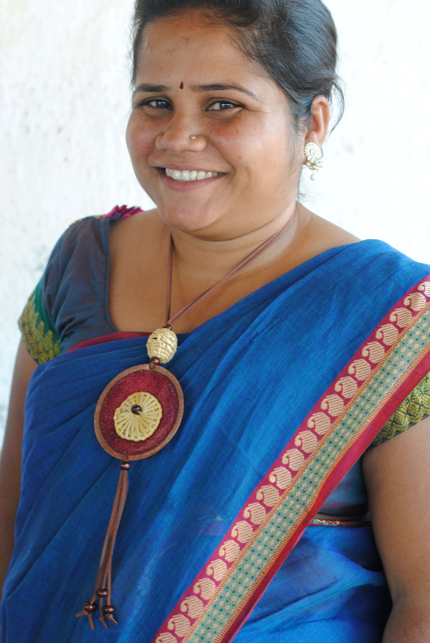 Truna natural fibre golden grass and copper enamel handcrafted jewelry from Odisha, Vaati red pendant