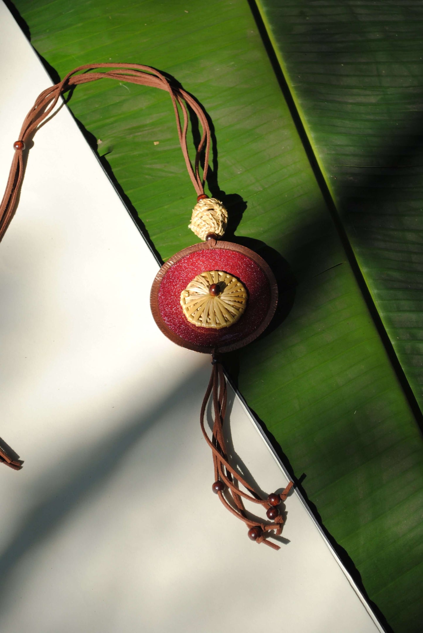 Truna natural fibre golden grass and copper enamel handcrafted jewelry from Odisha, Vaati red pendant