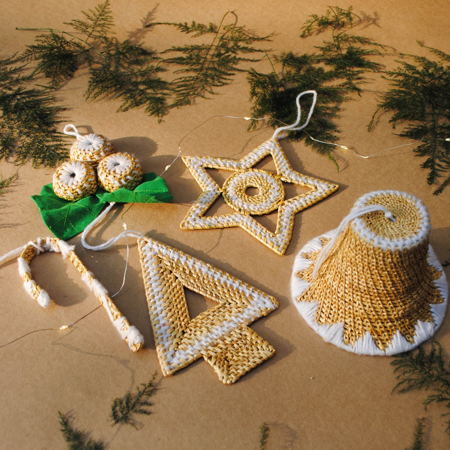 Handcrafted golden grass weavers create Christmas ornaments as new designs to keep the old art relevant in modern days