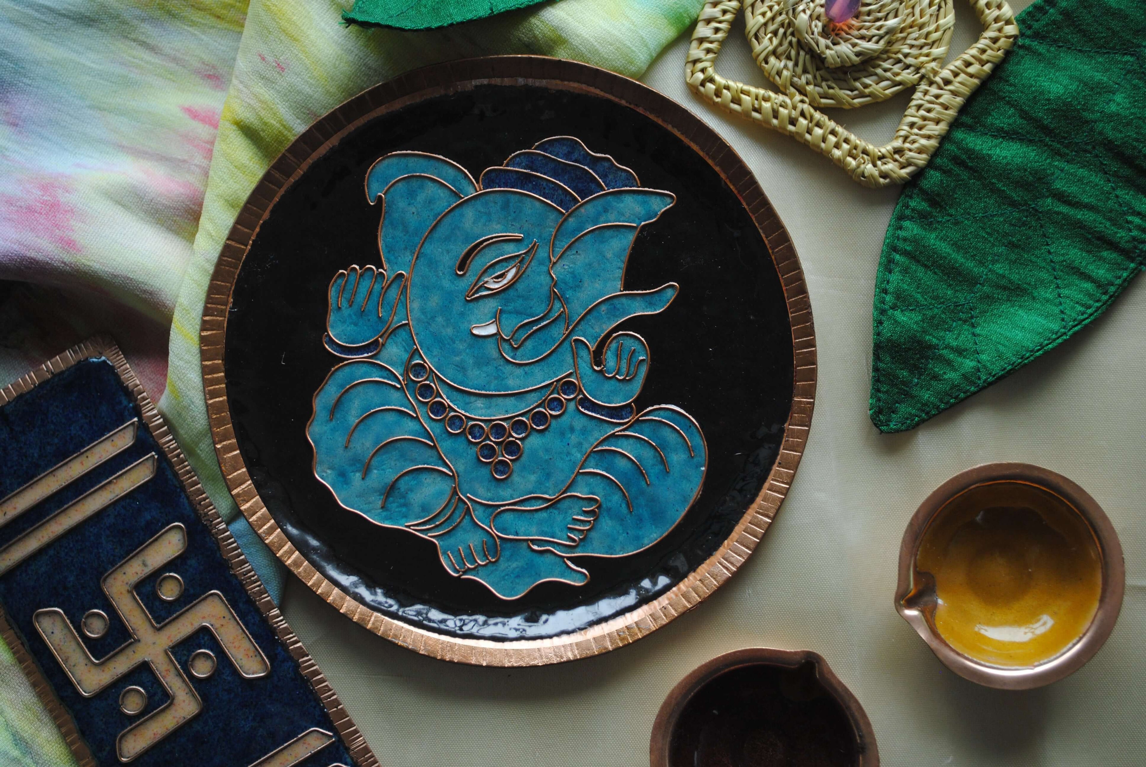 Home decor wall plates of Ganesh as Omkara, Ekdanaka, Vinayaka, handpainted and enameled on beaten copper