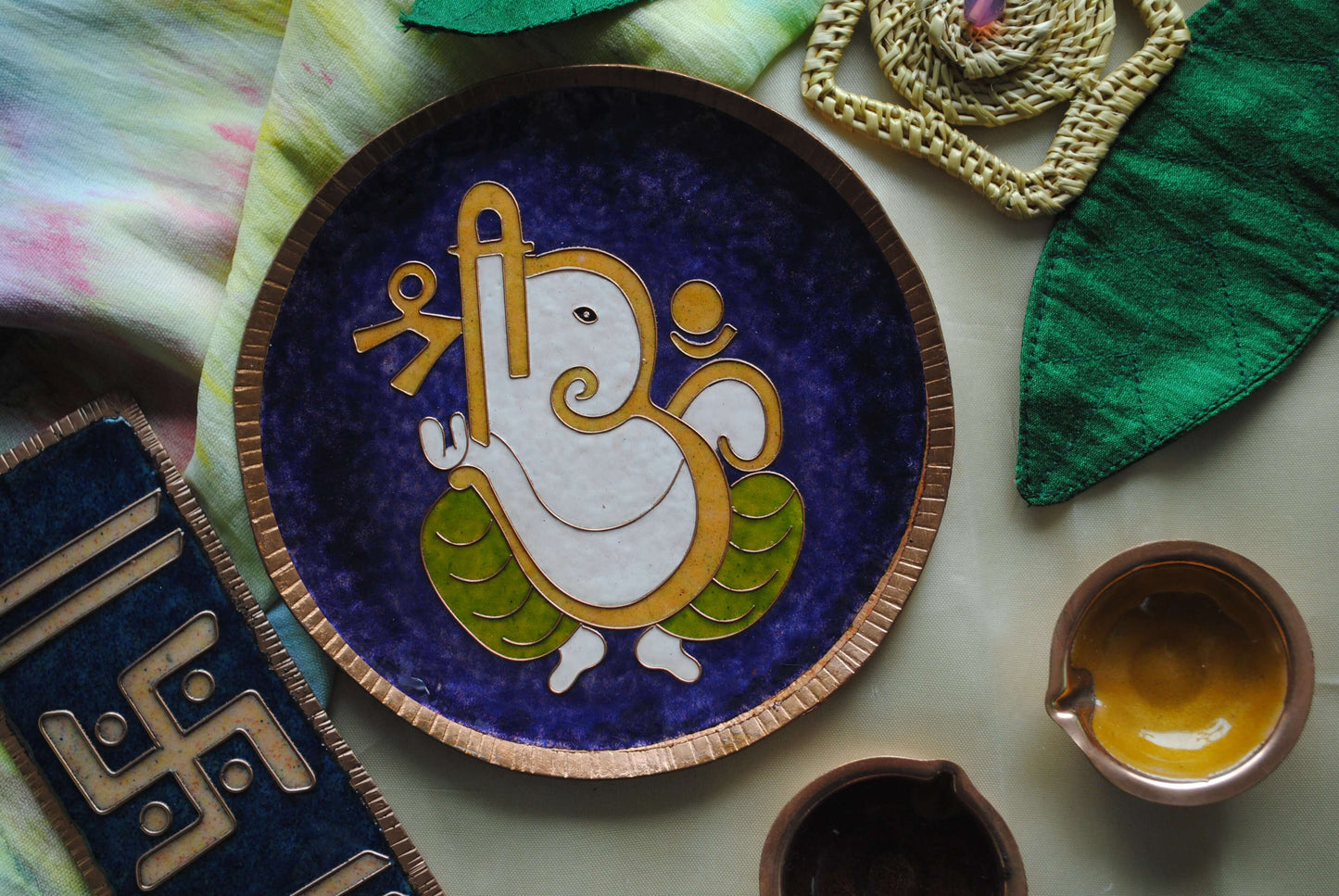 Home decor wall plates of Ganesh as Omkara, Ekdanaka, Vinayaka, handpainted and enameled on beaten copper