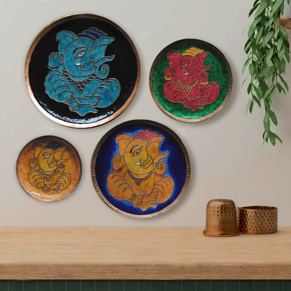 Home decor wall plates of Ganesh as Omkara, Ekdanaka, Vinayaka, handpainted and enameled on beaten copper