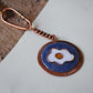 Copper enamel trinkets, keychain handcrafted in Maharashtra, India. Funky egg design