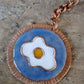 Copper enamel trinkets, keychain handcrafted in Maharashtra, India. Funky egg design