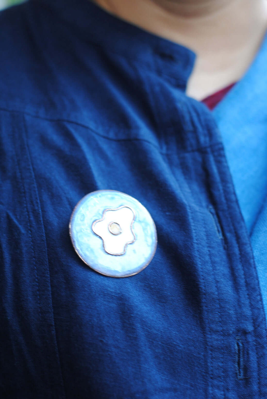 Copper enamel trinkets, lapel pin handcrafted in Maharashtra, India. Funky egg design