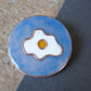 Copper enamel trinkets, lapel pin handcrafted in Maharashtra, India. Funky egg design