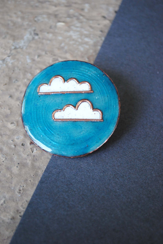 Copper enamel jewelry, lapel pin handcrafted in Maharashtra, India. Baadal design