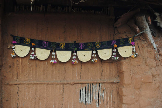 Handcrafted golden grass weavers create torans as new designs to keep the old art relevant in modern days