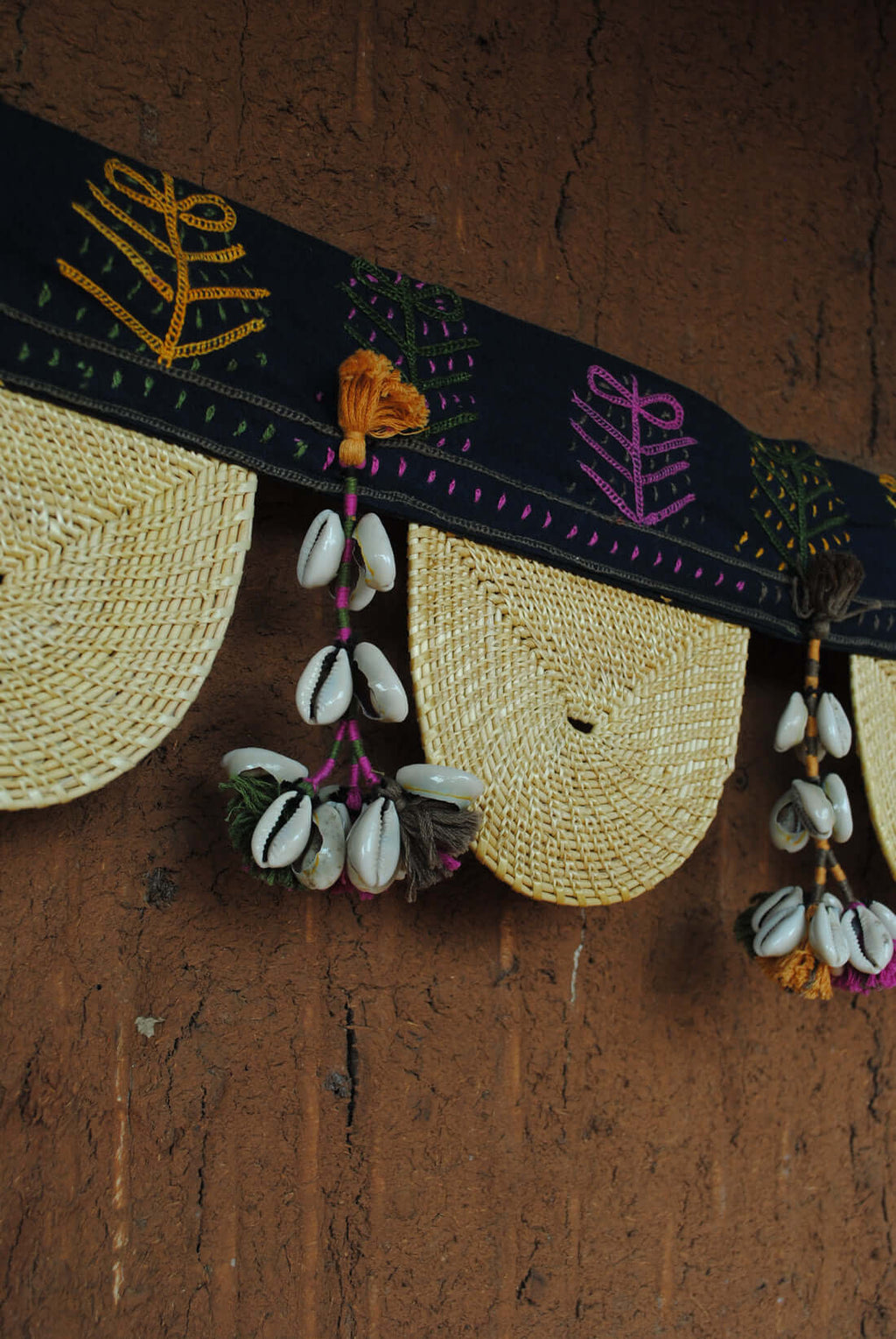 Handcrafted golden grass weavers create torans as new designs to keep the old art relevant in modern days