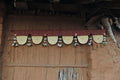 Handcrafted golden grass weavers create torans as new designs to keep the old art relevant in modern days