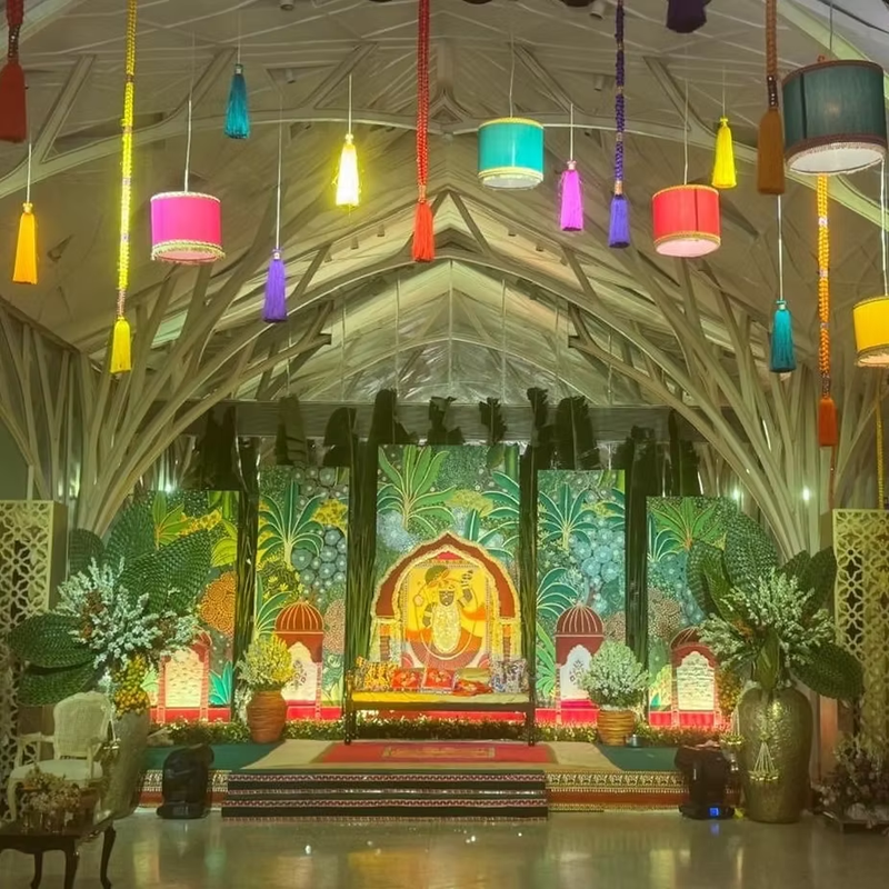 Decorative indoor setting for wedding with local artisanal backdrop