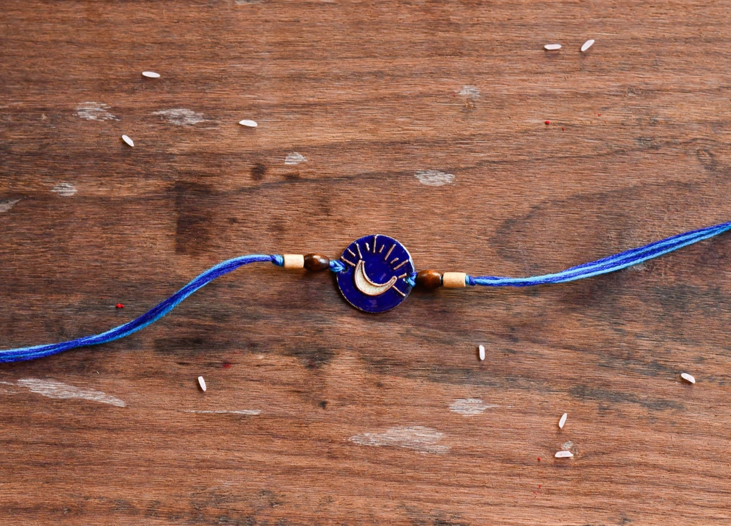 Handcrafted Chanda Copper Enamel Rakhi by EkiBeki