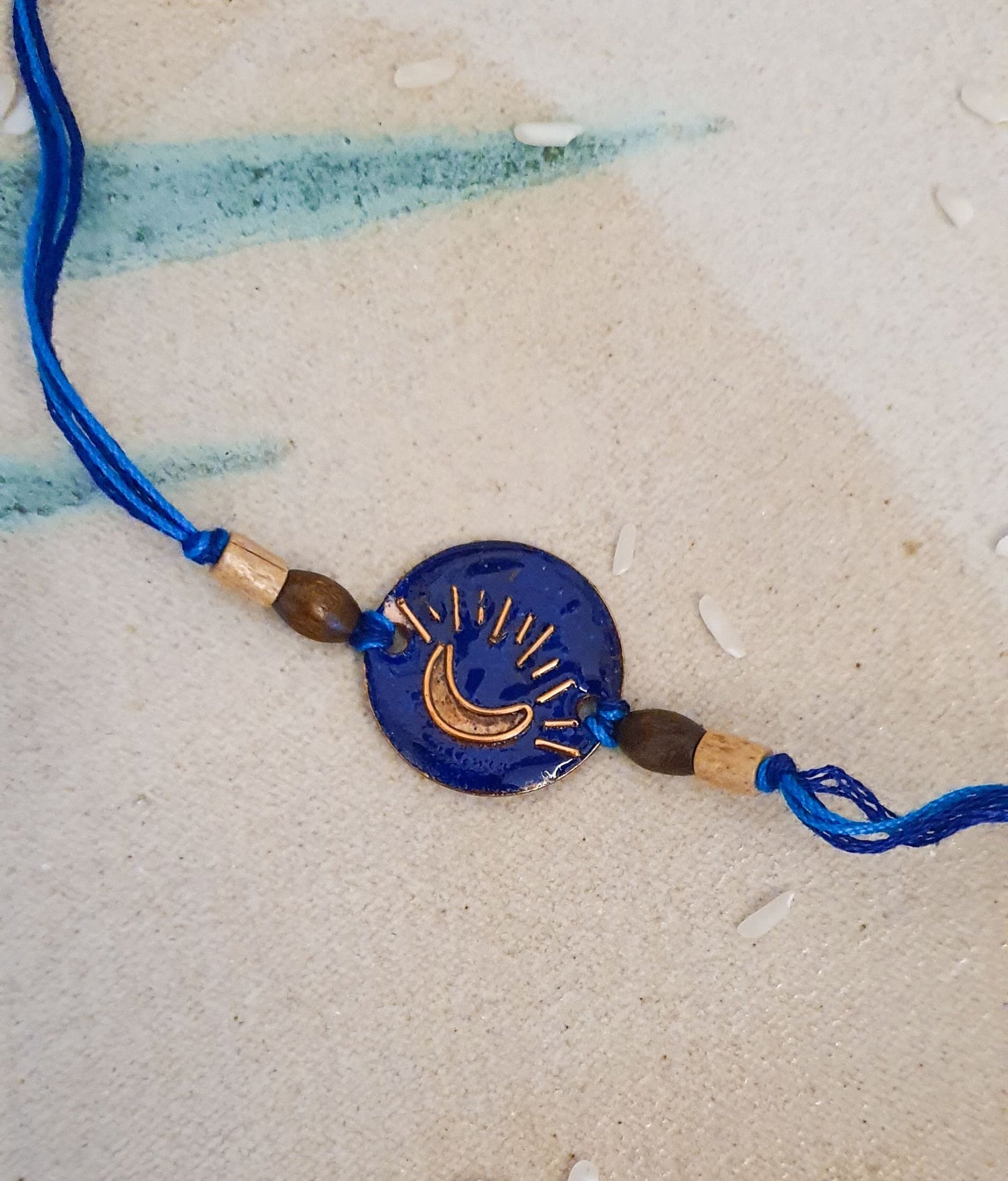 Handcrafted Chanda Copper Enamel Rakhi by EkiBeki