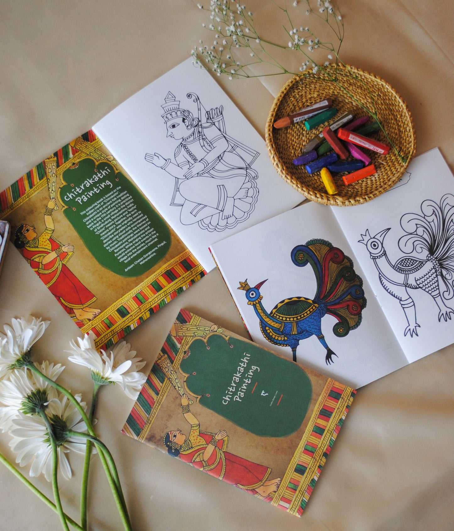 Artwork by native craftsmen of Chitrakathi, Gond, that are used as motifs to create stationery and colouring books